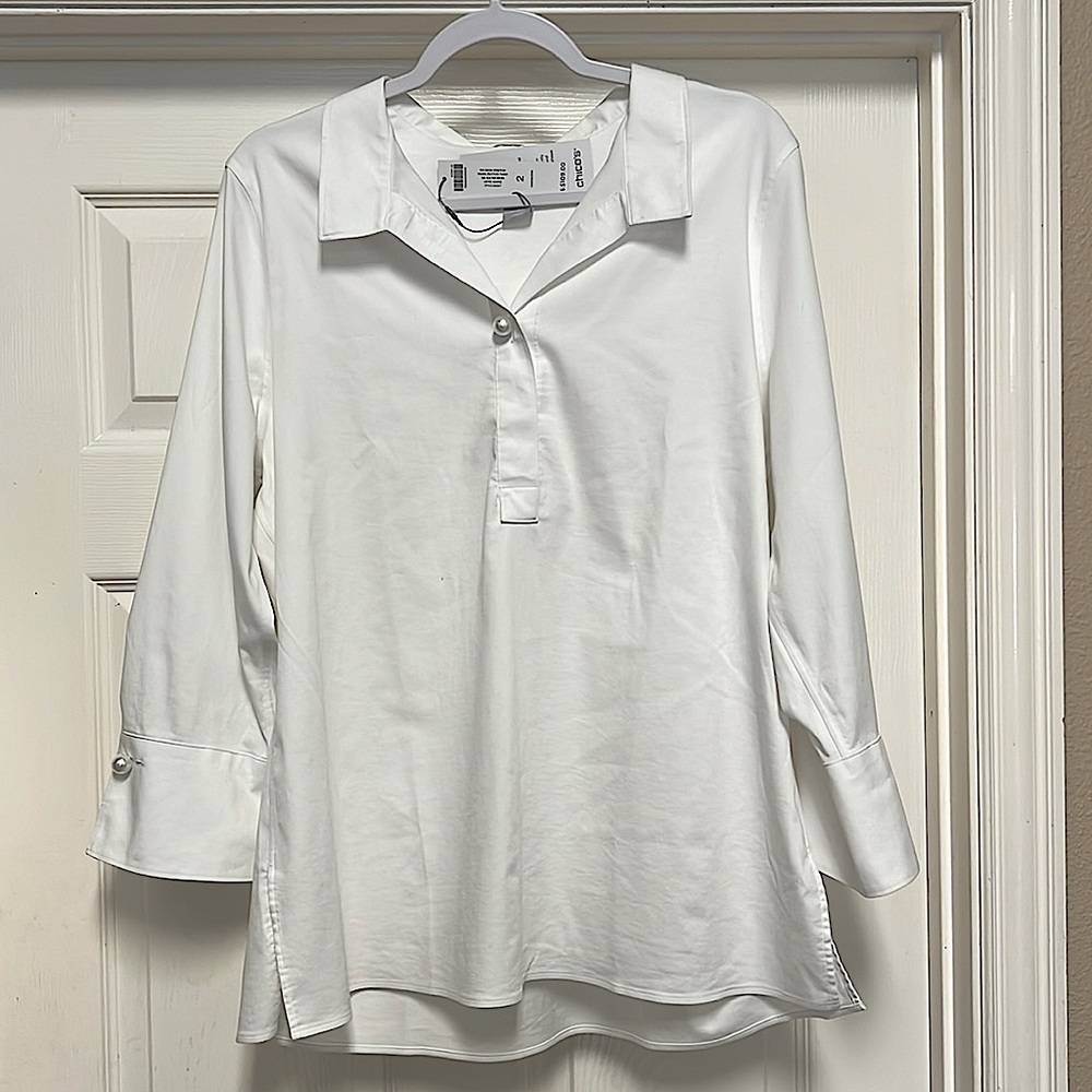 Chico’s no iron pearl button tunic.